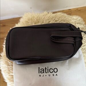 NEW WITH TAGS-LATICO DOPPLER BAG. Deep Brown with top zipper.